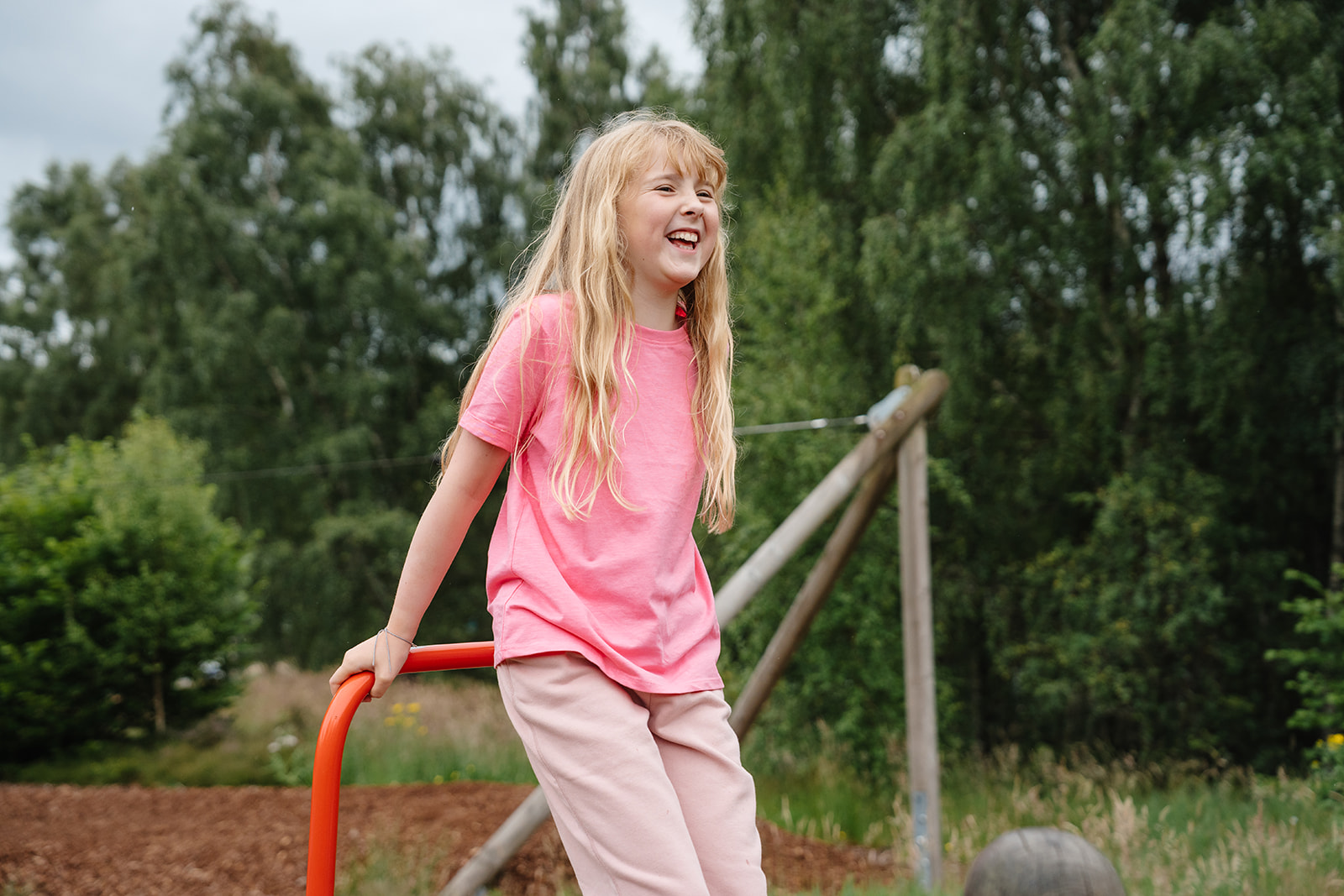 Visitor (girl) laughing at the playpark. IMAGE: Rachel Hein July 2025