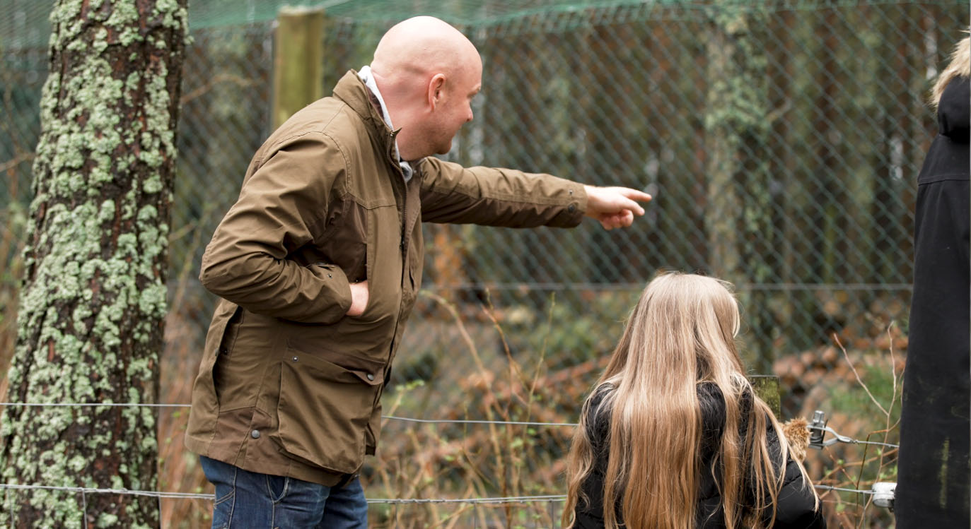 Father and daughter point at wolf wood IMAGE: FoSho 2023